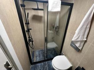 Koupelna v ubytování al khayma suit room