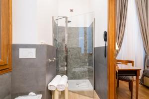 Koupelna v ubytování Strozzi Palace Hotel