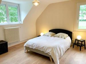 En eller flere senge i et værelse på Villa Marie-Lou entièrement rénovée