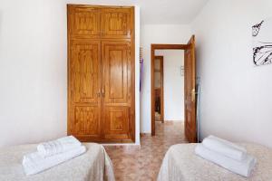 Postel nebo postele na pokoji v ubytování Villa Luisa 2 en Frontera