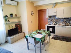 Η κουζίνα ή μικρή κουζίνα στο Grab a Flat in Coroneo