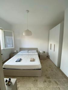 A bed or beds in a room at La Casina di Forte