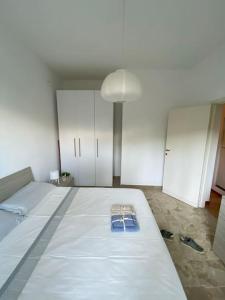 A bed or beds in a room at La Casina di Forte