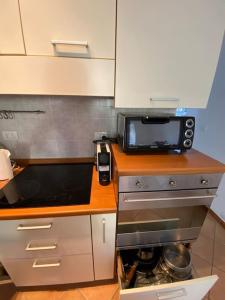 A kitchen or kitchenette at La Casina di Forte