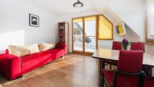 Posedenie v ubytovaní Apartamenty Sun & Snow Poronin