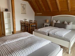 Postel nebo postele na pokoji v ubytování Gästehaus Brigitte Duri