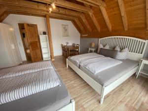 Postel nebo postele na pokoji v ubytování Gästehaus Brigitte Duri