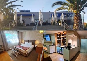 a hotel room with a bed and a palm tree at Hotel Albergaria Borges in Chaves