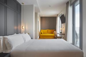 Postel nebo postele na pokoji v ubytování HOTEL ARRiZUL CATEDRAL 3 SUP