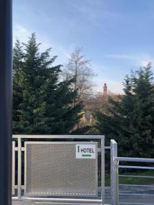 a metal gate with a hotel sign on it at Prealpina Hotel in Bagnolo Piemonte +68 photos