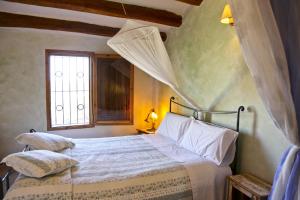 Posteľ alebo postele v izbe v ubytovaní Arianella Holiday Home Penedes