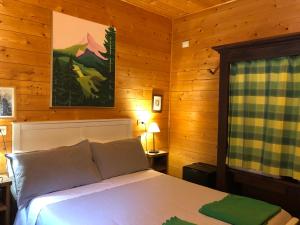 Ένα ή περισσότερα κρεβάτια σε δωμάτιο στο Ca dal Cros +71 φωτογραφίες