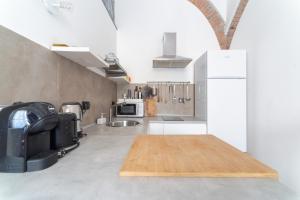 Kuchyň nebo kuchyňský kout v ubytování GRAND CENTRAL 1845 - Meliora Apartments
