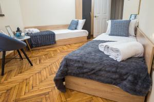 Postel nebo postele na pokoji v ubytování Apartment Zdravets, in the heart of the old city