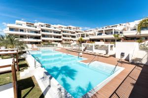 Bazén v ubytovaní 218 Cala de mijas Lotus Jardinana alebo v jeho blízkosti