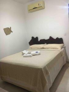 Voodi või voodid majutusasutuse Casa Xiê com piscina, churrasqueira e jardim toas