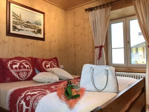 Postel nebo postele na pokoji v ubytování Chalet Ame