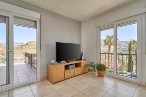 Μια τηλεόραση ή/και κέντρο ψυχαγωγίας στο Apartamento Vistamar