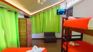 Postel nebo postele na pokoji v ubytování Hostal La Siesta