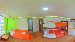Postel nebo postele na pokoji v ubytování Hostal La Siesta