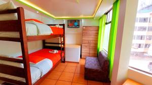 Postel nebo postele na pokoji v ubytování Hostal La Siesta
