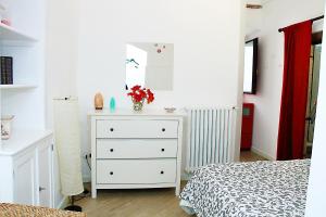 Postel nebo postele na pokoji v ubytování Lo studio di Nonno