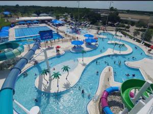 a large water park with a water slide at Lovely 2 bedroom house plus a dent with private pool in North Port