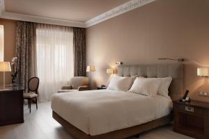 Voodi või voodid majutusasutuse Hotel Rector toas