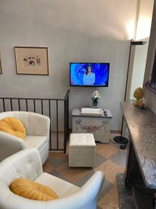 A television and/or entertainment centre at Accademia Dream