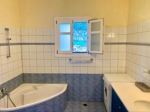 Koupelna v ubytování Pandora Villa