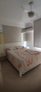 Cama o camas de una habitación en Apartamento Balneário Camboriu