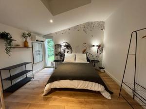Postel nebo postele na pokoji v ubytování Magnifique Villa avec piscine en Sologne