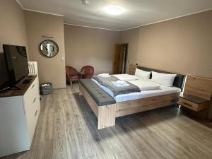 Postel nebo postele na pokoji v ubytování Hotel Gonzlay