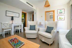 Uma área de estar em Homeincalpe Borumbot