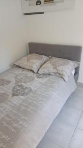 Posteľ alebo postele v izbe v ubytovaní Villa dans une pinède