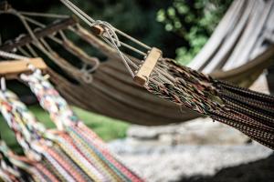 a close up of a hammock with a bench at Faulenzerhotel in Friedersbach