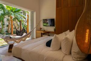Postel nebo postele na pokoji v ubytování Olbil Hotel Boutique