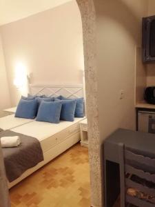 Ένα ή περισσότερα κρεβάτια σε δωμάτιο στο Dionisia apartments 8
