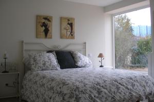 A bed or beds in a room at Casa la Manzanera