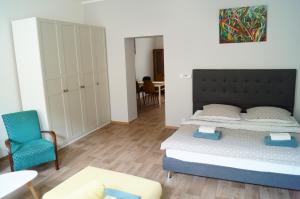 Postel nebo postele na pokoji v ubytování Apartmány Mary