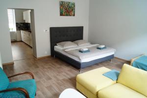 Postel nebo postele na pokoji v ubytování Apartmány Mary