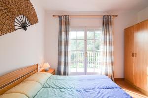 Postel nebo postele na pokoji v ubytování Club Villamar - Solterra + 21 fotografií