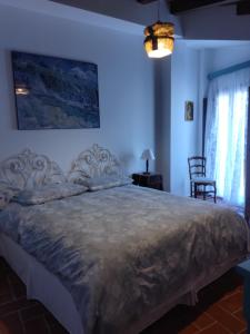 Postel nebo postele na pokoji v ubytování La Locanda n'gima all' ara