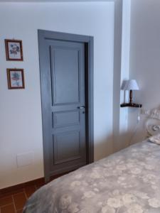 Postel nebo postele na pokoji v ubytování La Locanda n'gima all' ara