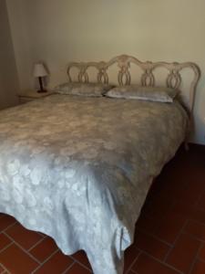 Postel nebo postele na pokoji v ubytování La Locanda n'gima all' ara