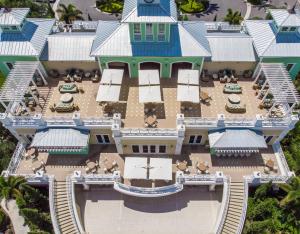 an aerial view of a house with a patio at Splendid Home with Loft Area & Private Pool near Disney by Rentyl - 7619B in Orlando