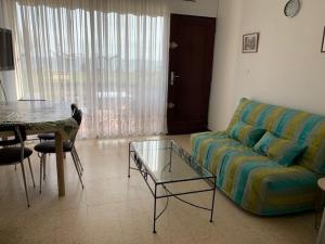 Posedenie v ubytovaní Appartement ⭐⭐ à Balaruc-les-Bains avec climatisation et jardin, animaux admis - FR-1-503-156