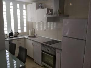 Kuchyň nebo kuchyňský kout v ubytování Apartamento Playa Albir