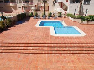 Bazén v ubytování Apartamento Playa Albir nebo v jeho okolí