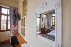 Letto o letti in una camera di Ruby 'n Emerald studio's